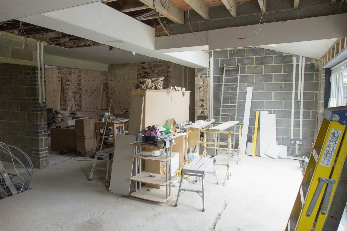 Home interior during renovation with framing and drywall work
