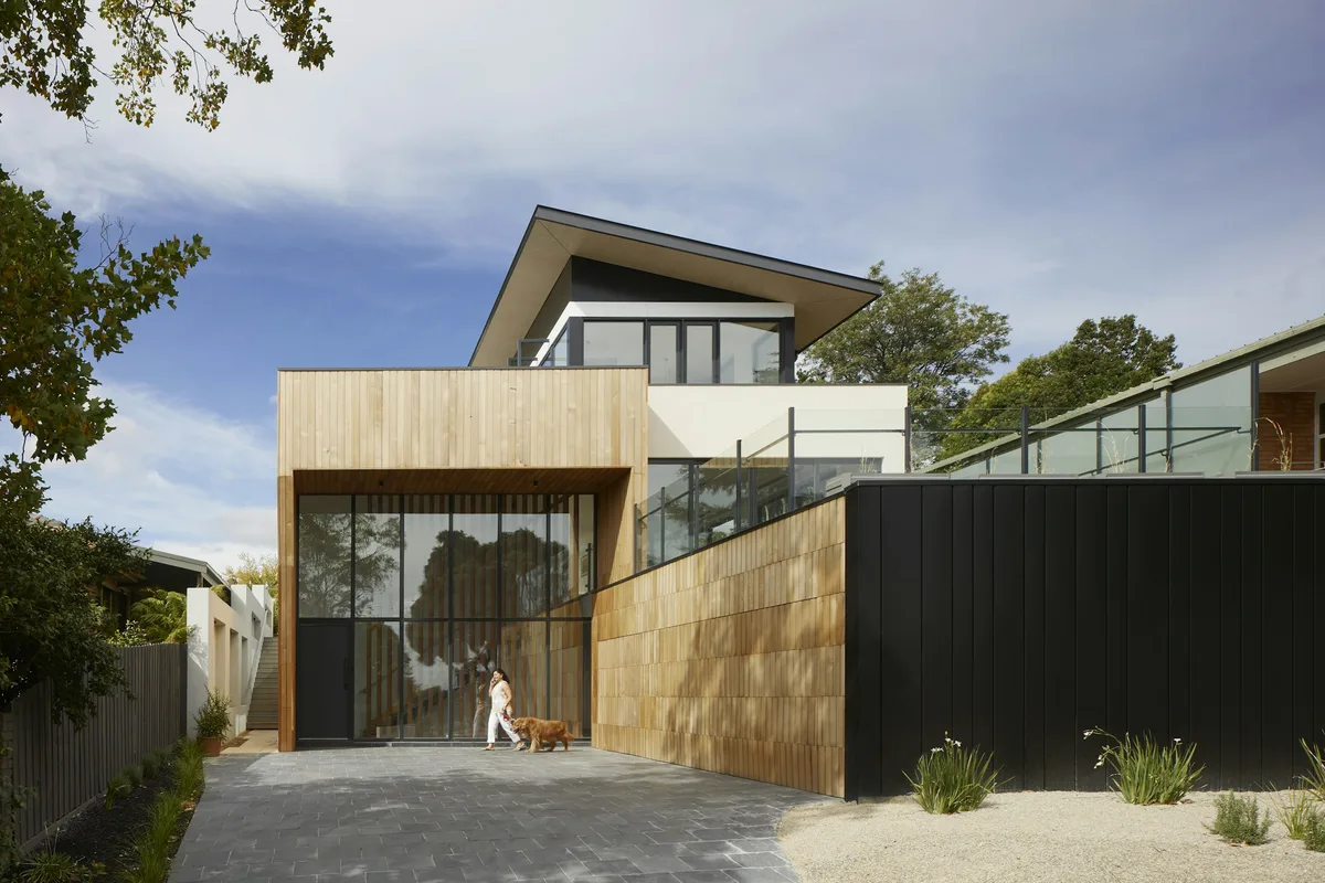 Modern home exterior with wood and glass